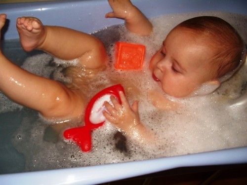 What should a child be able to do at 11 months?